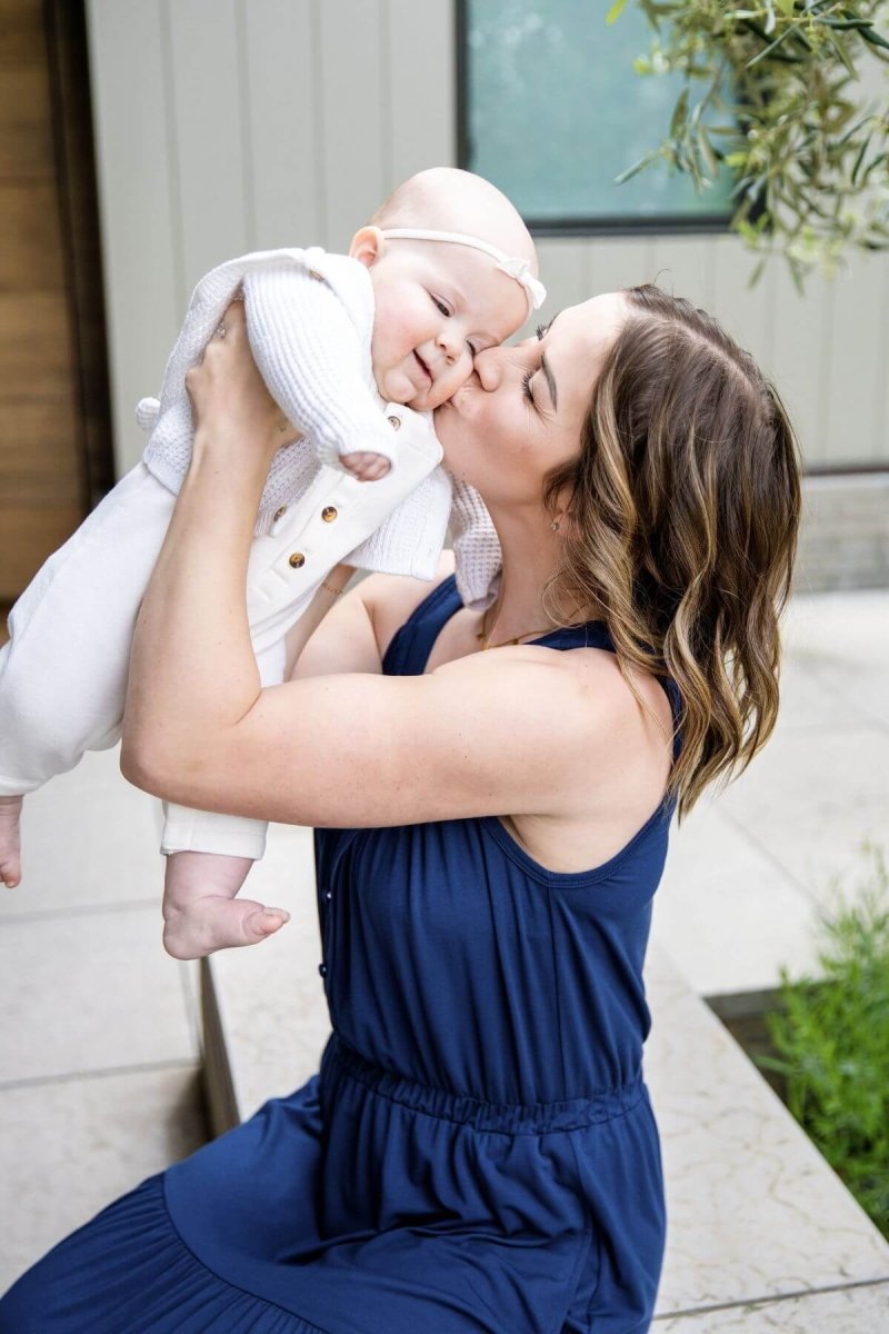 Lark Maternity & Nursing Maxi Dress - Indigo - Simple Wishes - full body front on postpartum model with baby lifestyle image2