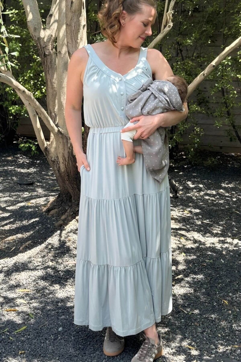 Lark Maternity and Nursing Dress in Ether front view mom and baby lifestyle styled with the Haven Nursing Cover