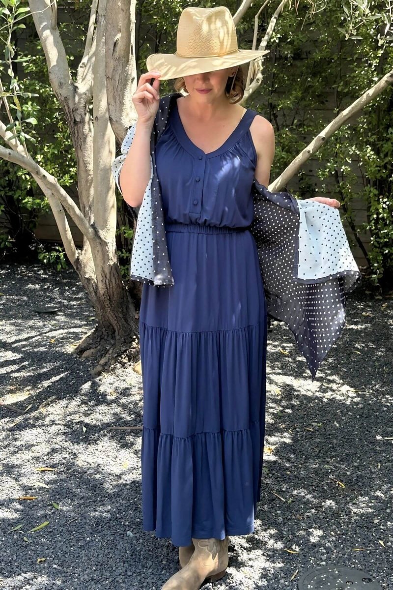 Lark Maternity and Nursing Dress in Indiigo front view full body styled with hat and Haven Nursing Cover in navy dots