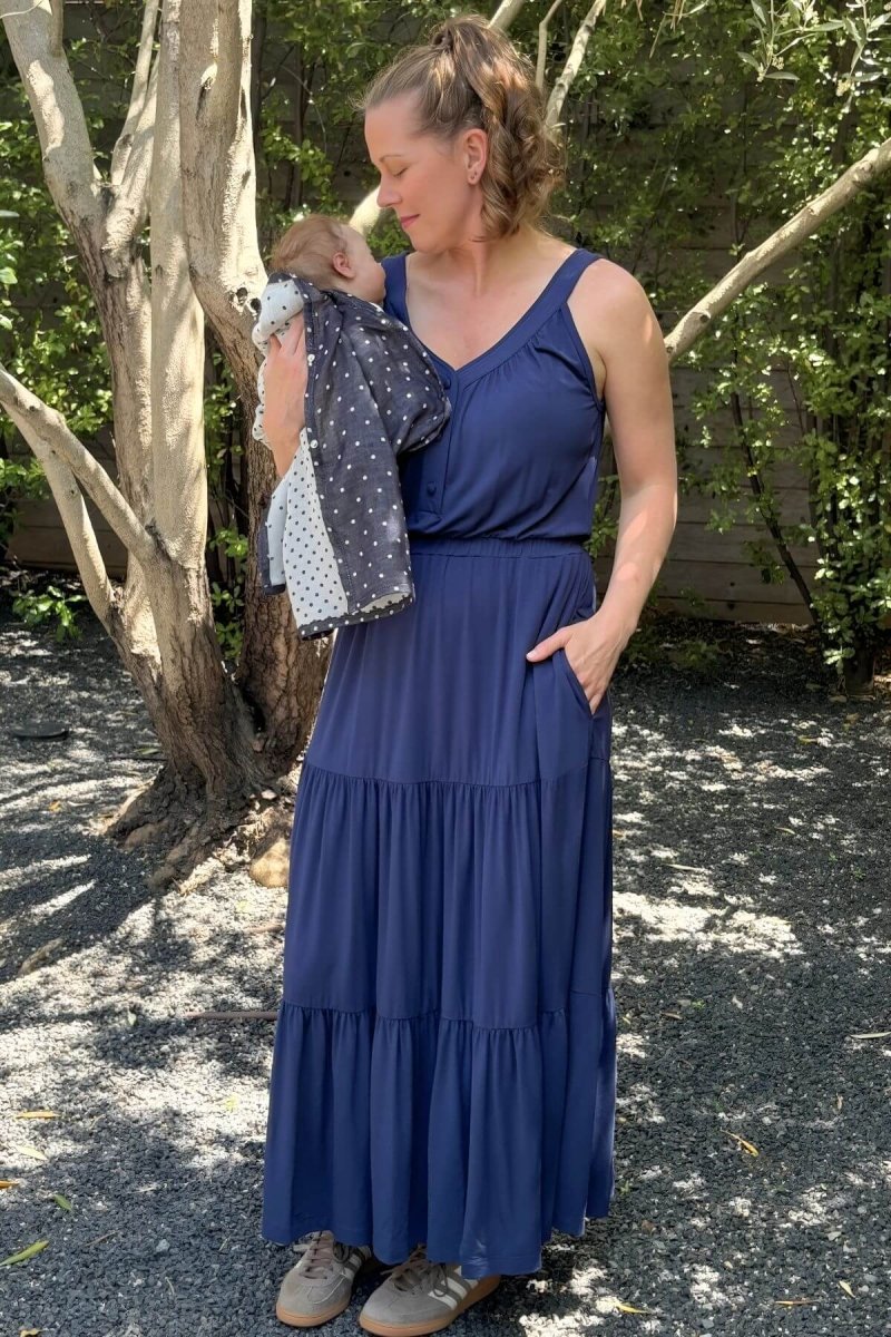 Lark Maternity and Nursing Dress in Indiigo front view mom and baby styled with Haven Nursing Cover in navy dots