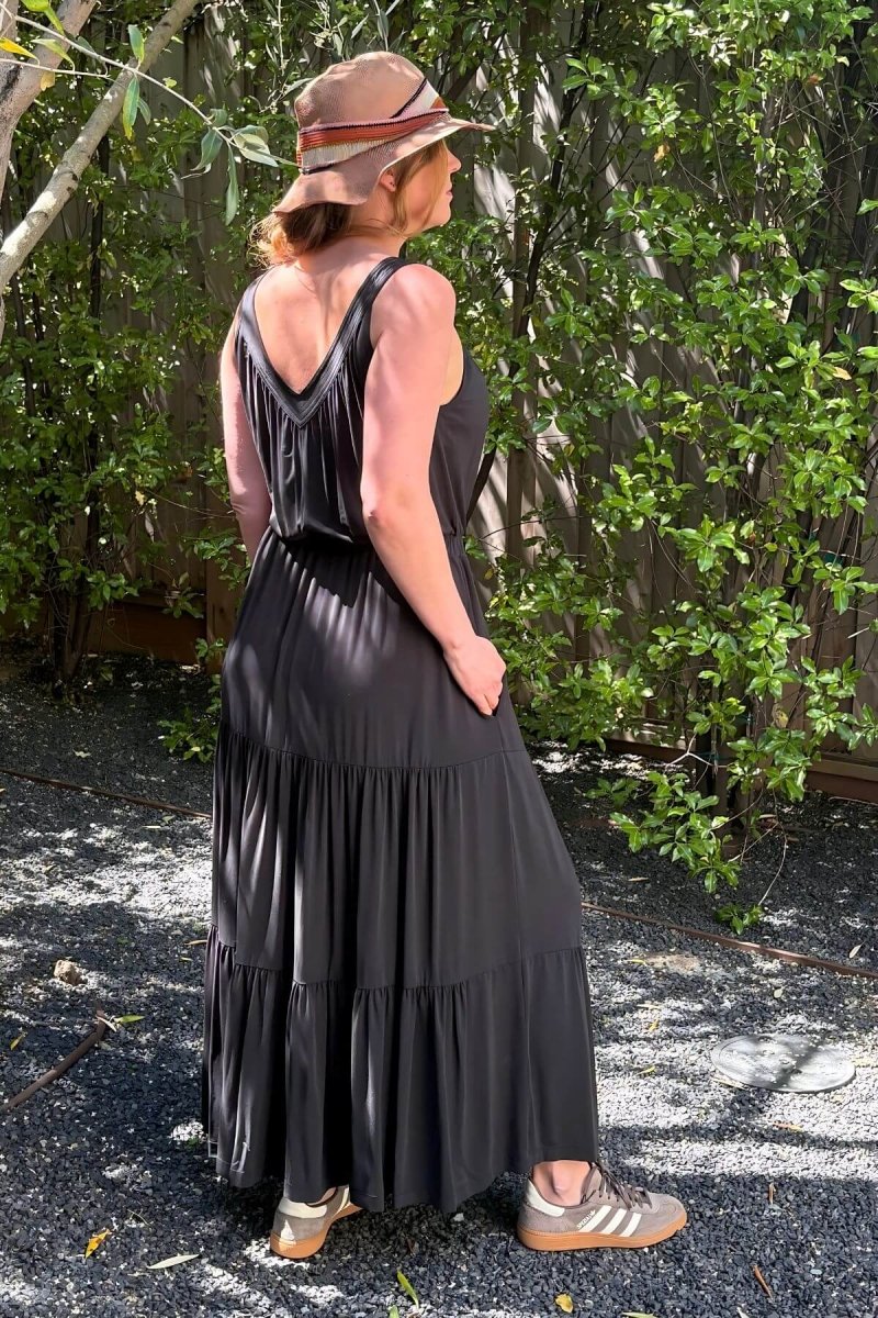 Lark Maternity and Nursing Dress in Midnight full length styled with hat and sneakers