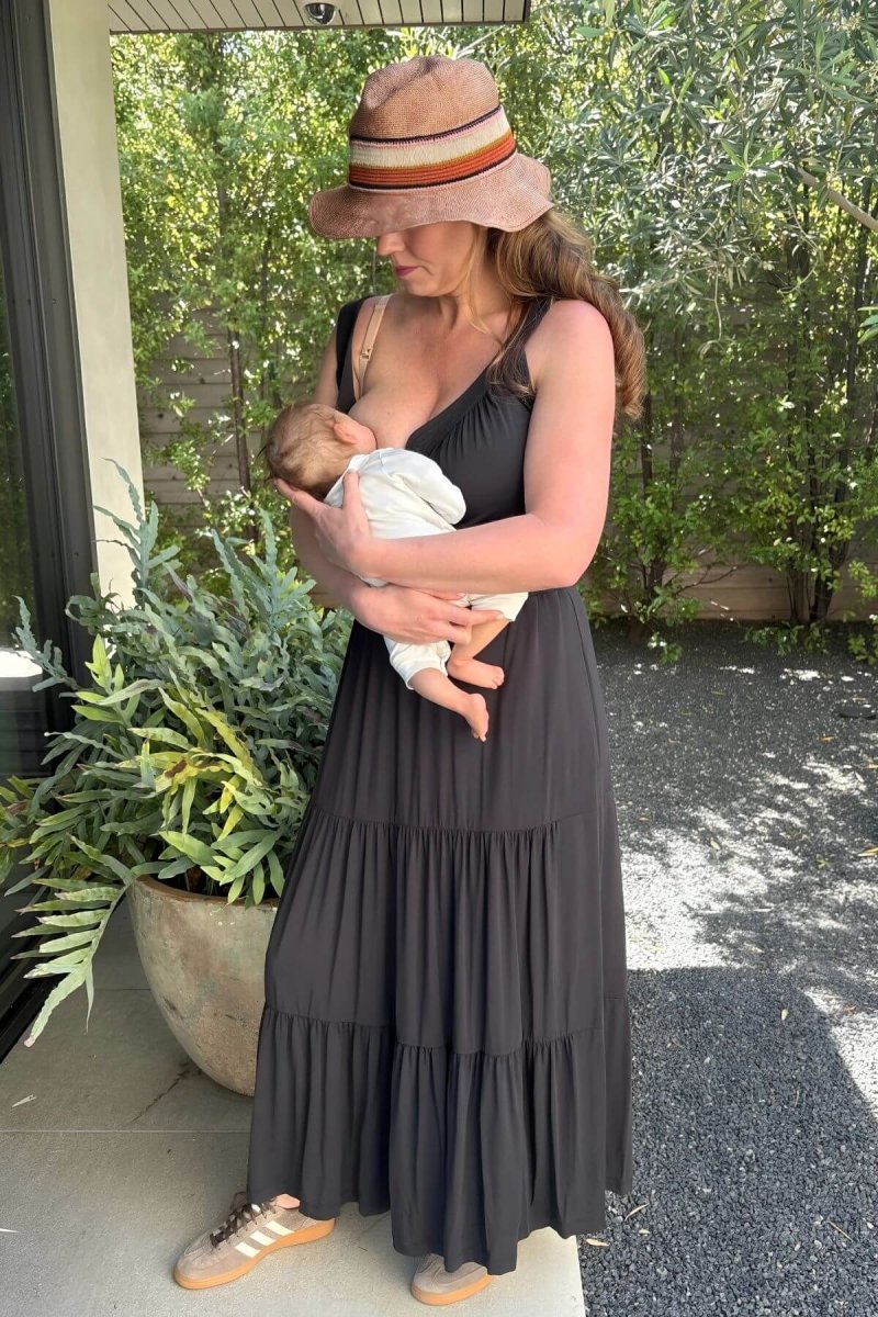 Lark Maternity and Nursing Dress in Midnight front view full body breastfeeding lifestyle
