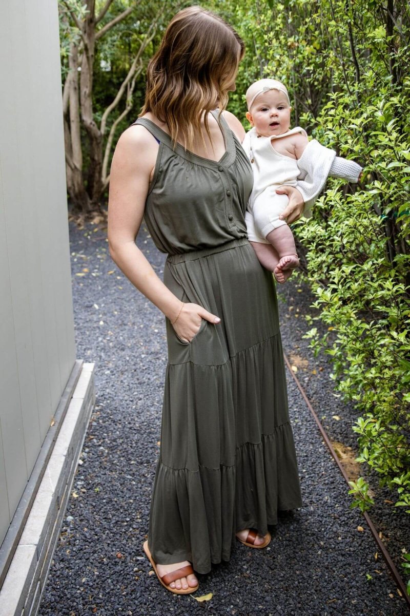 Lark Maternity and Nursing Dress in Olive Green full length front view lifestyle mom and baby