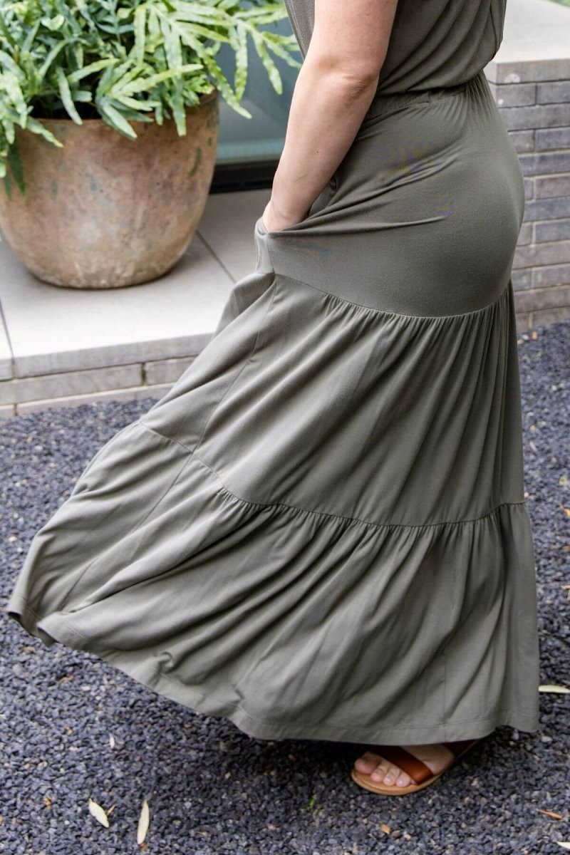 Lark Maternity and Nursing Dress in Olive Green full length side view of skirt detail
