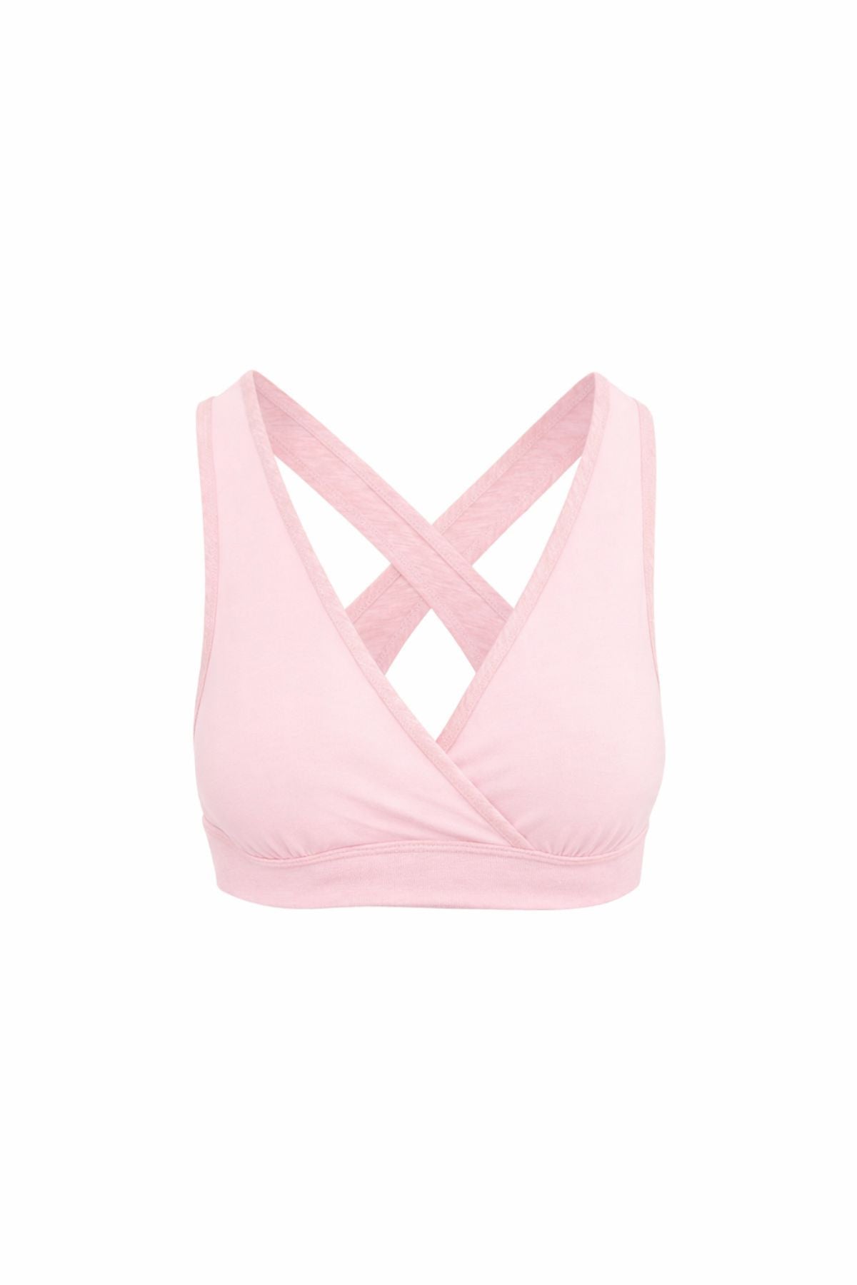 Pink nursing sleep bra with criss-cross straps on a white background
