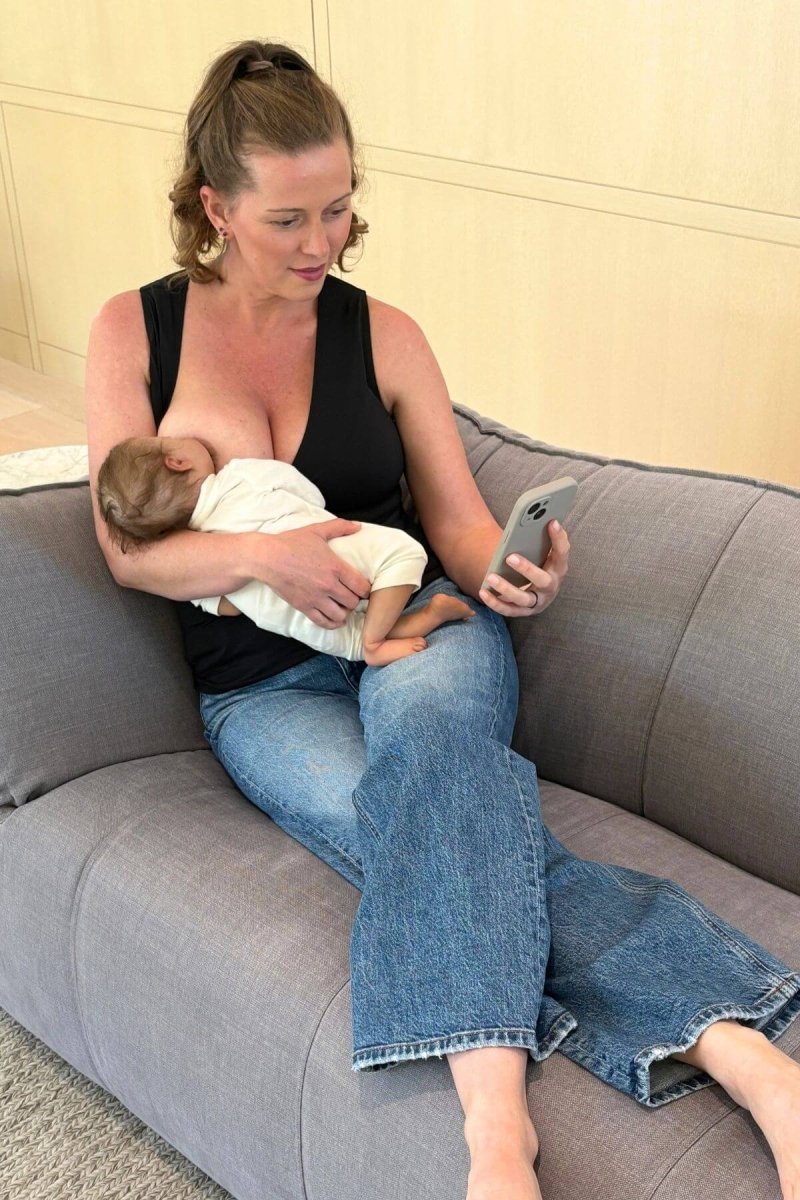 Simple Nursing Tank Midnight seated lifestyle mom breastfeeding baby
