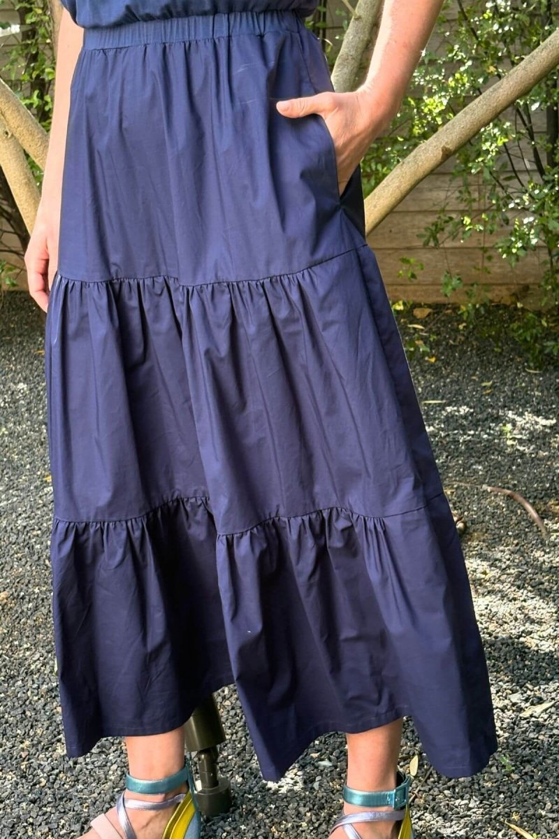Willow Nursing Dress - Indigo - Simple Wishes - front view closeup of waterfall skirt detail and pocket