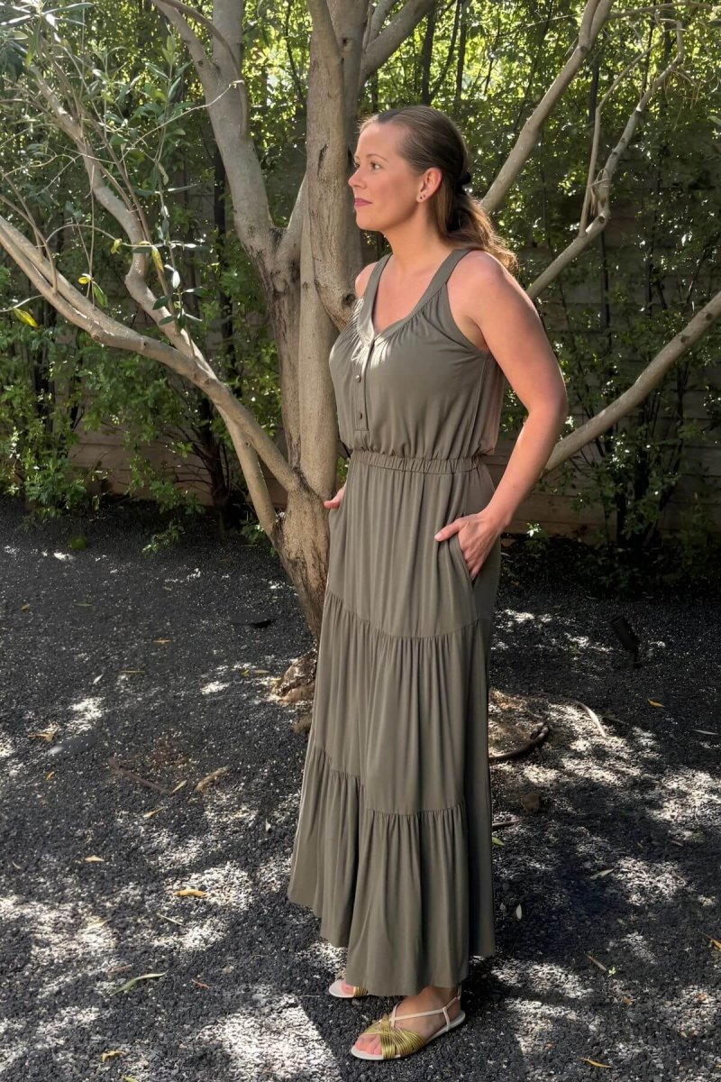 Lark Maternity and Nursing Dress in Olive Green front view full length in profile styled with sandalsl