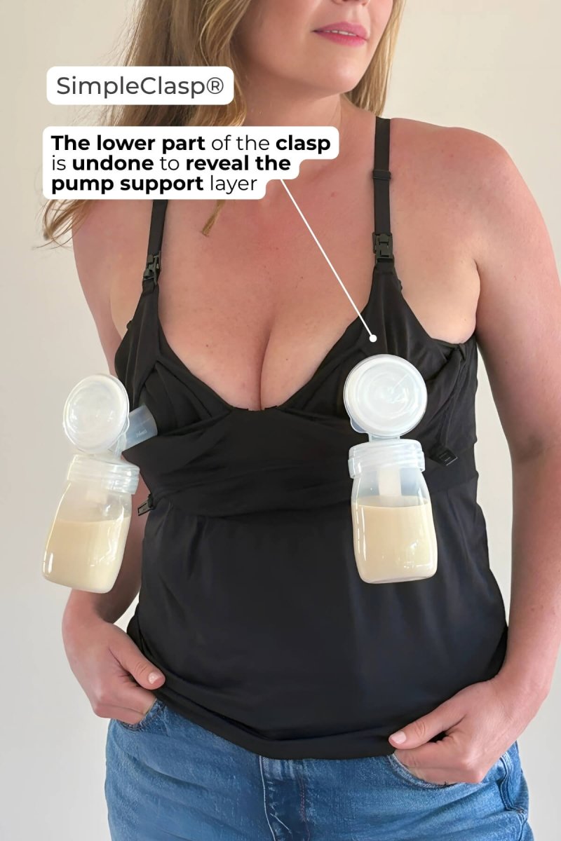 SuperMom® Silhouette Nursing & Pumping Seamless Tank - Simple Wishes - color midnight - inforgraphic showing how the lower part of the clasp has been undone on each cup to reveal the hidden pump support layer which is supporting completely full bottles of breastmilk with no tipping away.
