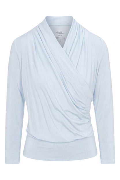 A light blue long-sleeve wrap top with a draped, shawl-style collar, shown on a plain white background.