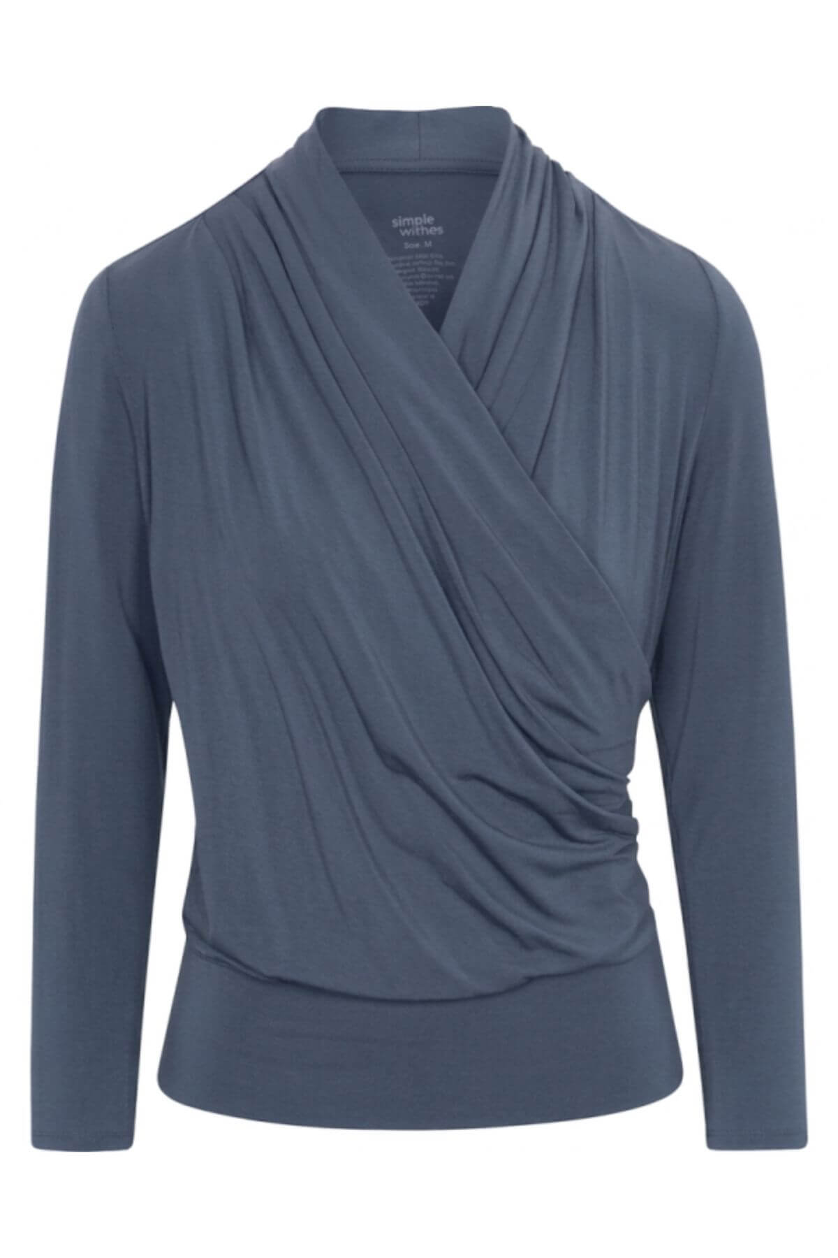 A slate blue long-sleeve wrap top with a draped, asymmetrical crossover front, shown on a plain white background.