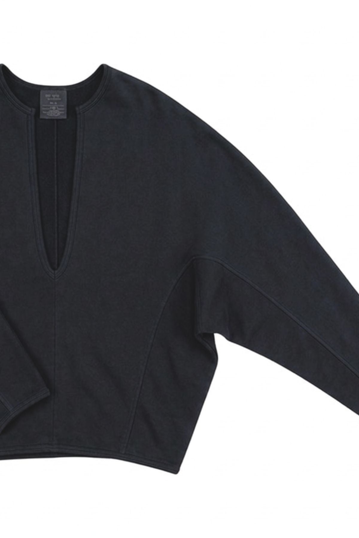 A black long-sleeve crop top with a deep V-neckline, laid flat against a white background.