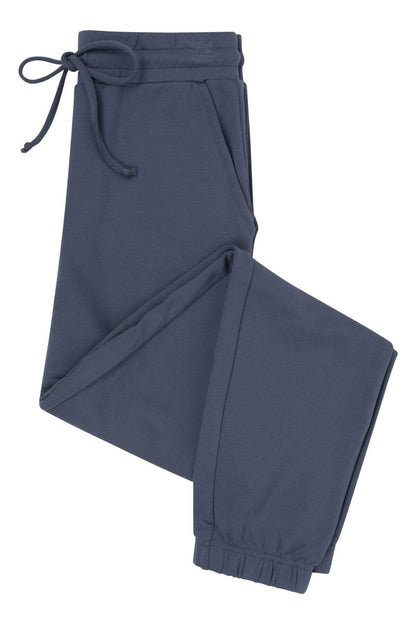 A pair of dark slate blue jogger pants with an elastic waistband, drawstring, and elastic cuffs, shown on a plain white background.