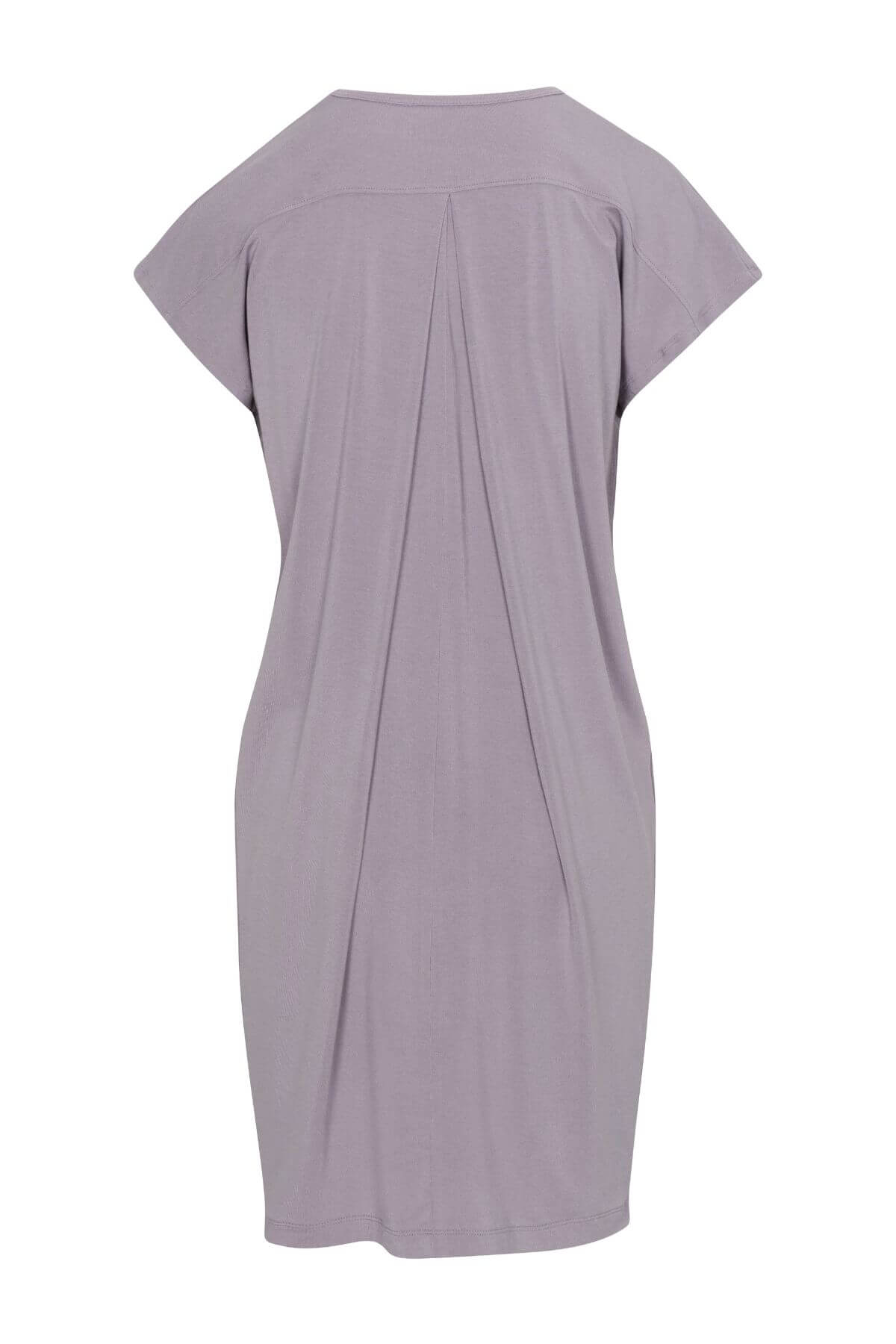 A short-sleeve tunic dress in a dusty lavender-purple color, shown from the back with a gathered center seam, on a plain white background.