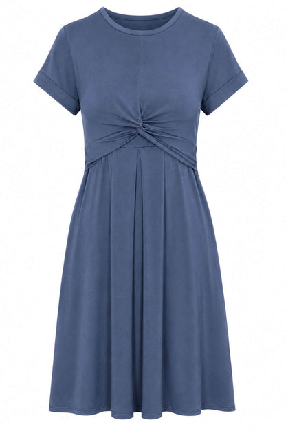 A short-sleeve blue dress with a gathered twist detail at the waist and a pleated skirt, shown against a plain white background.
