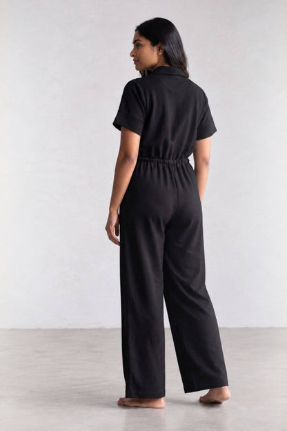 back view of midnight black jumpsuit designed for making breastfeeding access easy