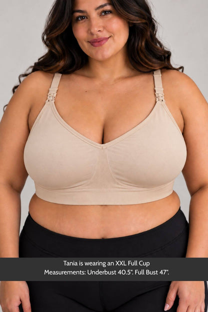 A plus-size woman wearing the supermom silhouette nursing and hands free pumping bra and wide straps, paired with black leggings. A text banner at the bottom provides sizing information for an XXL Full Cup size.