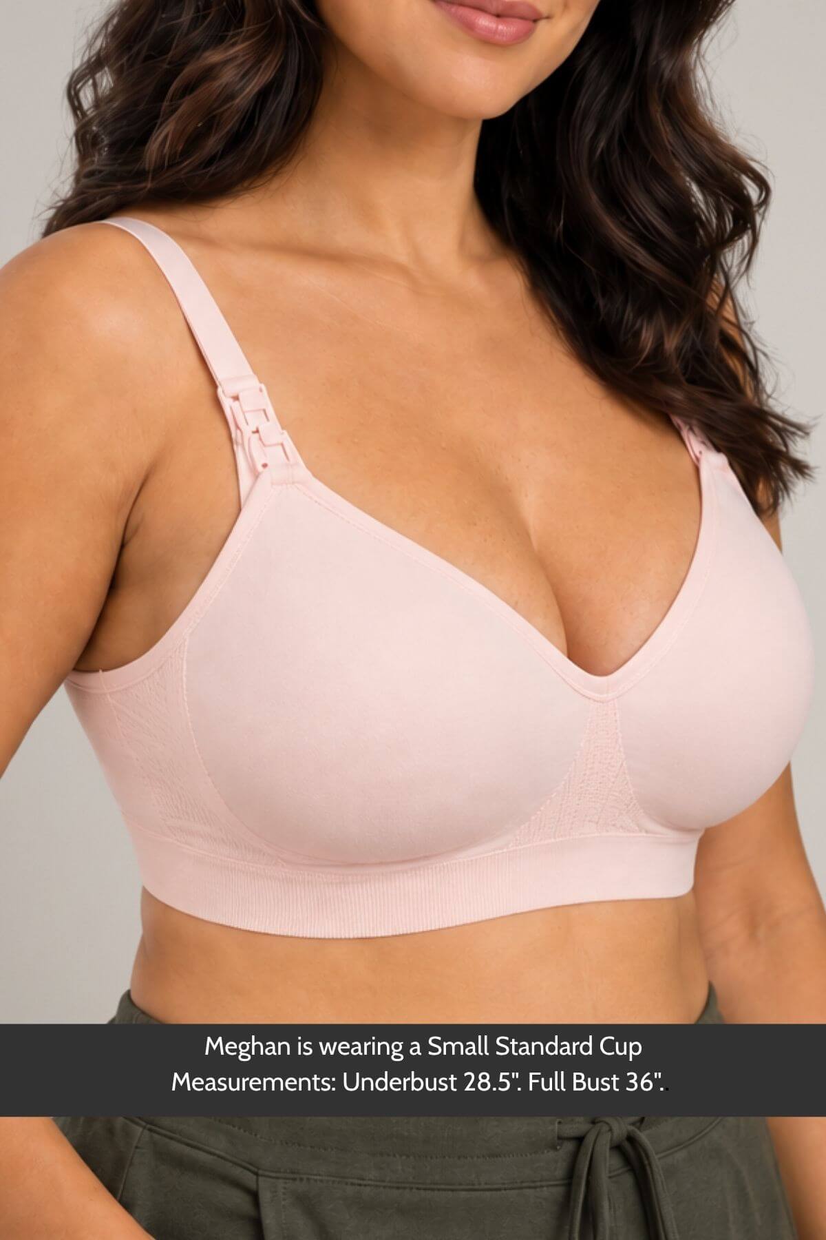 A woman wearing a simple wishes supermom silhouette nursing bra and hands free pumping bra in ballet slipper pink with afront djustable shoulder straps and a wide underband, shown from the chest down against a plain light gray background. A text banner at the bottom provides sizing information.