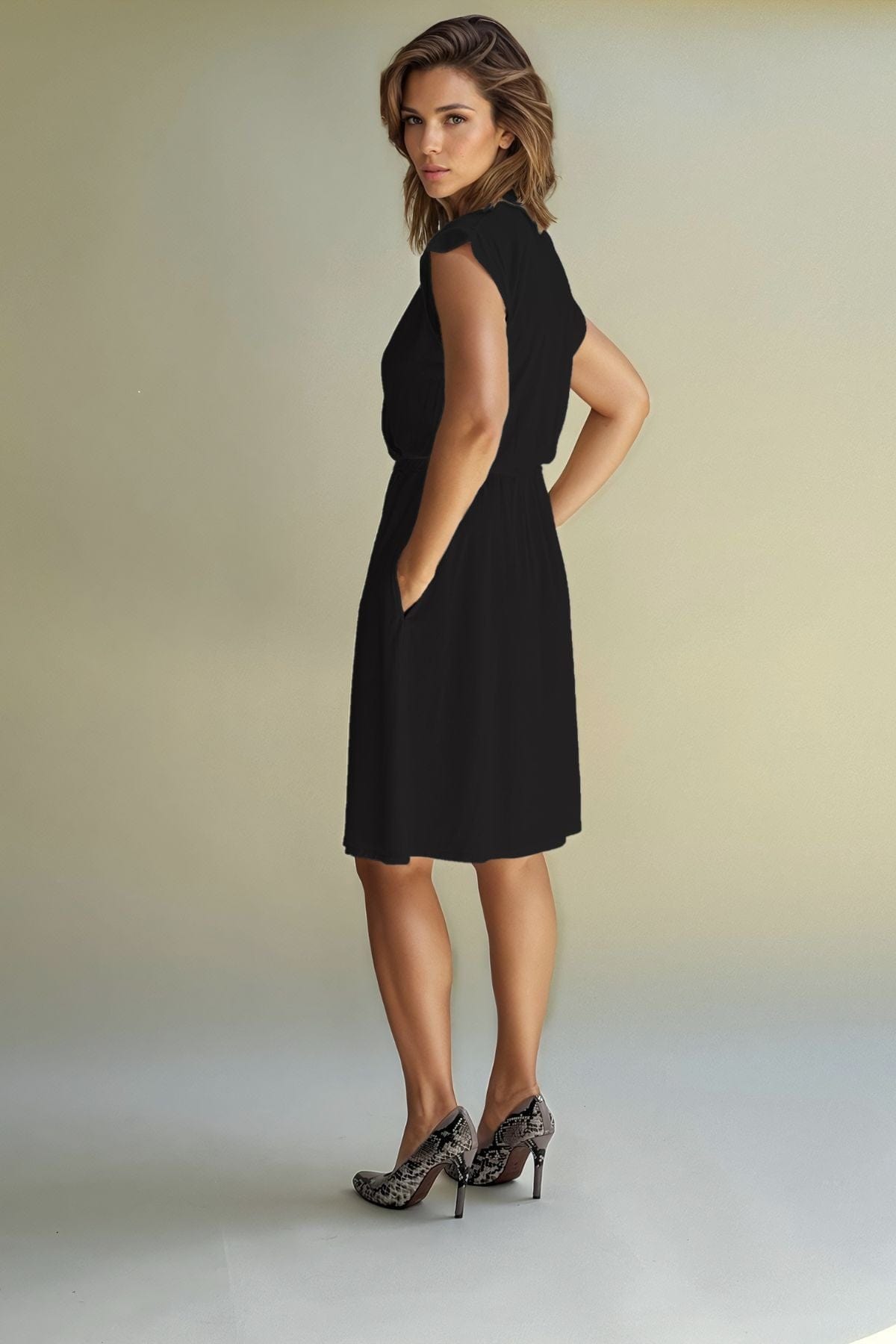 Harper Nursing Dress in midnight 3/4 side view while wearing high heels for date night