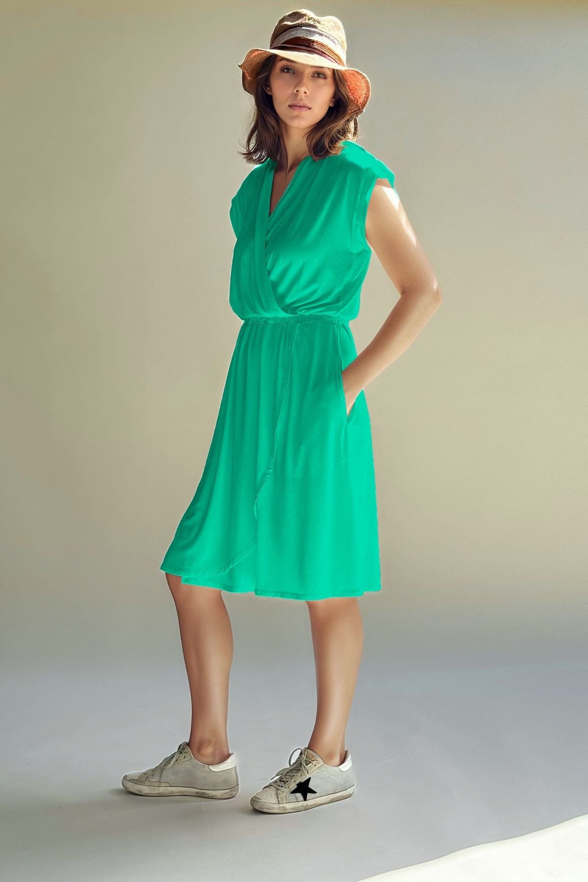 Harper Nursing Dress front view in emerald without baby
