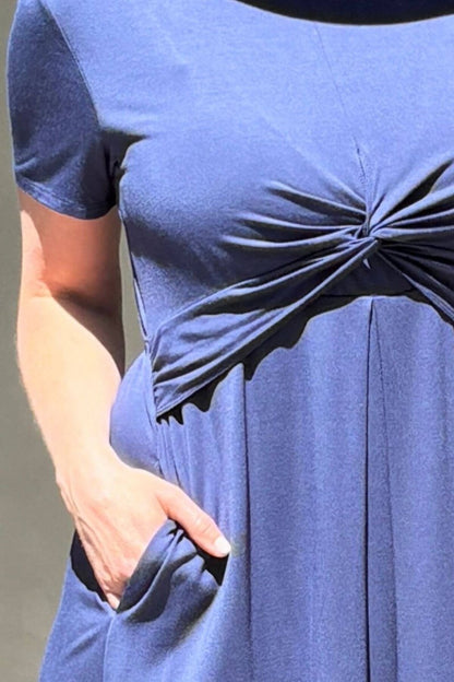 Liv Maternity &amp; Nursing Dress - Indigo - Simple Wishes - Front View Detail of knot front, pocket and short sleeve