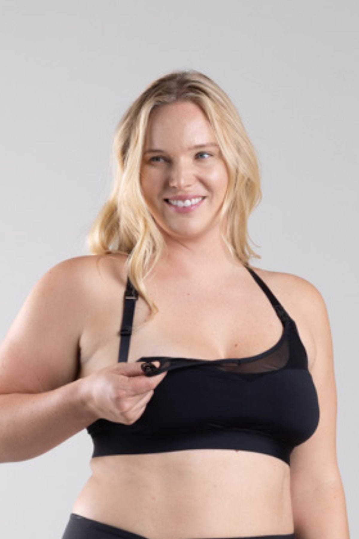 SuperMom Low Impact Nursing + Pumping Sports Bra Black Front View of dropped cup blonde model