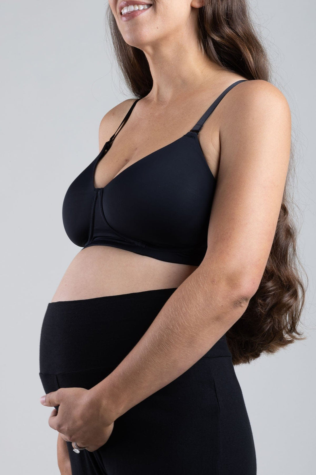 Simple Wishes Undercover Nursing T-Shirt Bra with hide the nursing clasp in black shown on pregnant model 
