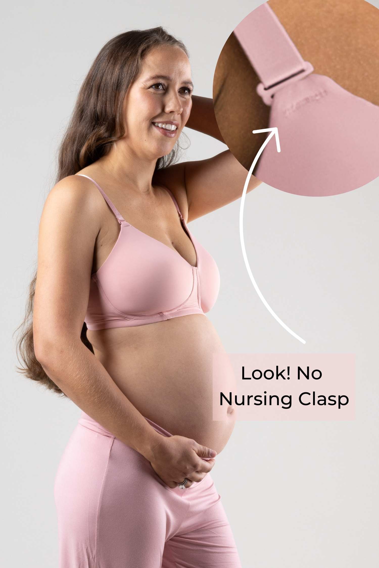 Undercover Nursing T-Shirt Bra in Rose Pink on Pregnant Brunette Model showing feature where plastic nursing clasp is hidden. Arrow points from inset of detail shot of apex of bra cup showing no visible nursing clasp.