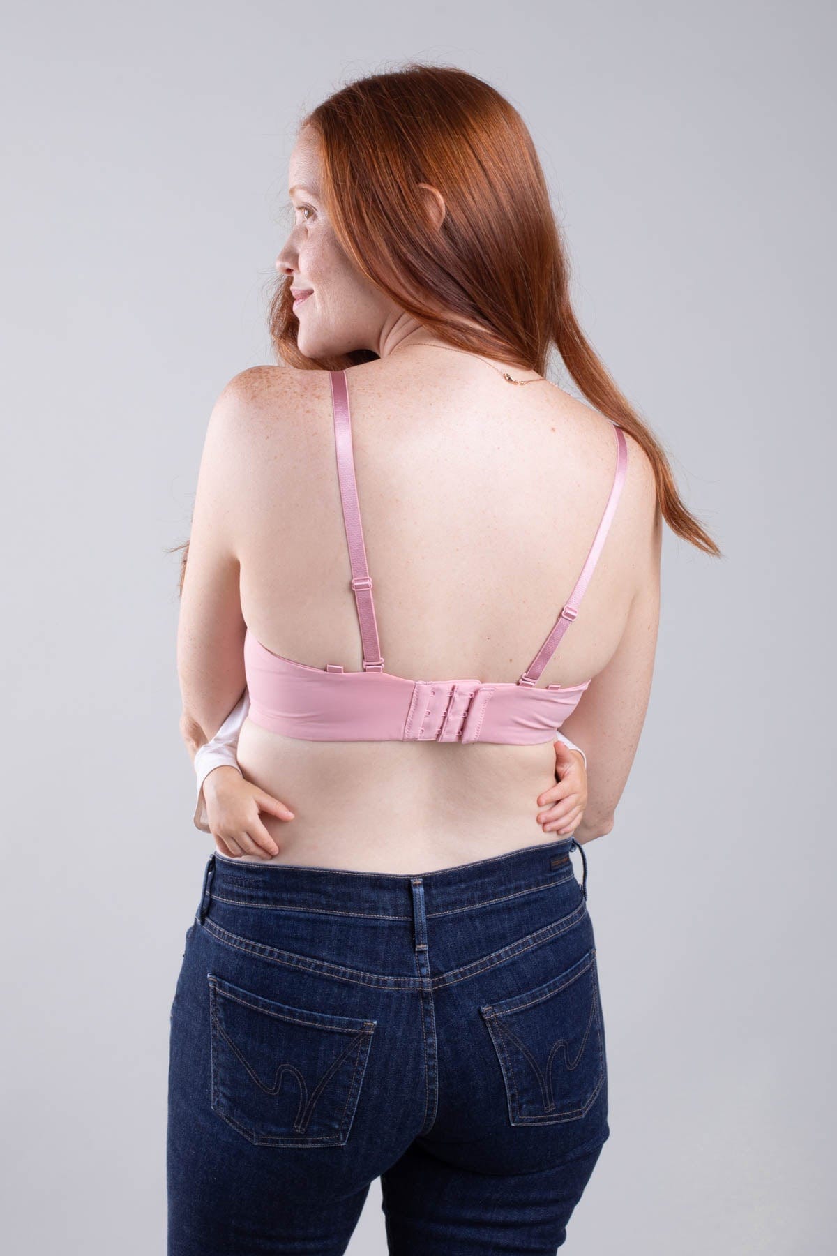 Simple Wishes Undercover nursing t-shirt bra with hide the nursing clasp feature in rose pink shown with baby back view